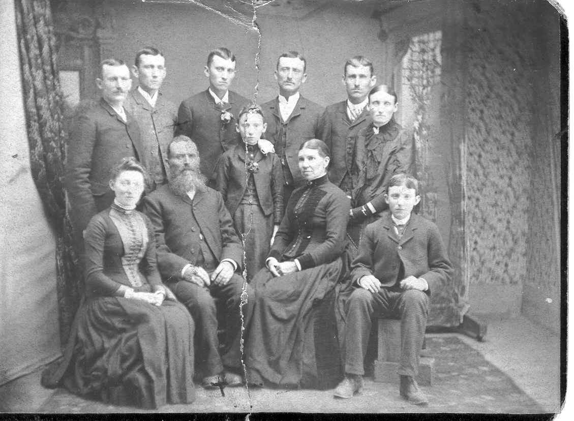 L to R:  John, Charles, James, Robert, Solomon, Margaret  Front Row, L to R:  Lois, Adam, Sarah, Jessie Laing, Samuel.
